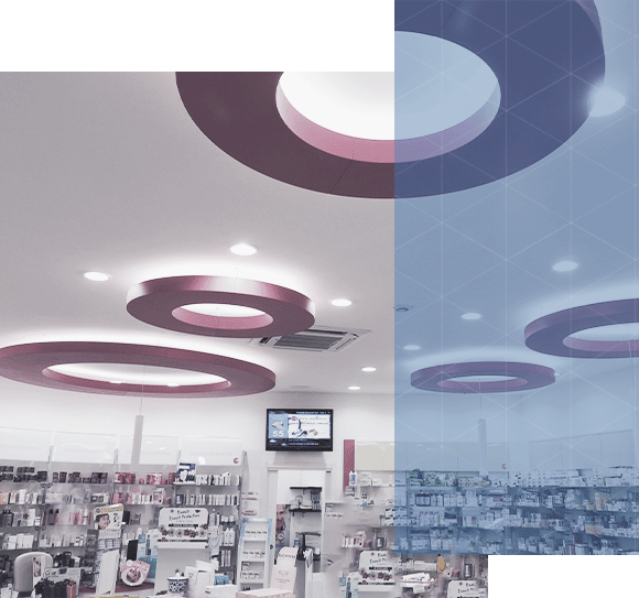 Interno di una farmacia con illuminazione moderna.